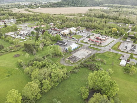 An image featuring plant, land lot, urban design, natural landscape, tree, biome, residential area, landscape, groundcover, grass at 1195 Golden Mile Rd.