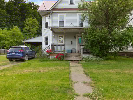 An image featuring plant, car, building, vehicle, window, tree, house, tire, land lot, wheel at 138 T-329.