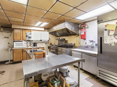A kitchen at 199 State St featuring: building, table, countertop, lighting, kitchen, interior design, wood, chair, flooring, house