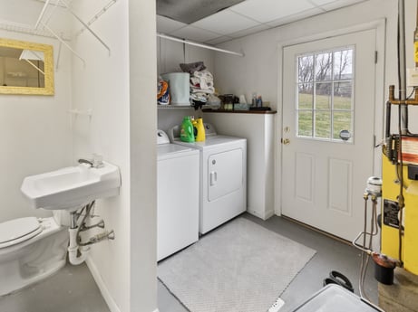 An image featuring property, cabinetry, building, window, interior design, yellow, shelving, shelf, sink, floor at 18 Country View Dr.