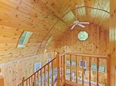 An image featuring building, wood, house, beam, wood stain, floor, hardwood, tree, door, flooring at 130 Haighs Pond Rd.