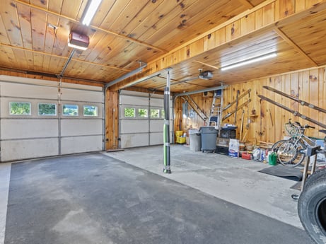 An image featuring tire, wheel, building, wood, bicycle wheel, bicycle, automotive tire, house, floor, flooring at 130 Haighs Pond Rd.
