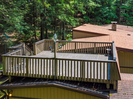 An image featuring plant, tree, wood, fence, shade, home fencing, leisure, hardwood, outdoor structure, cottage at 104 Stony Mountain Rd.