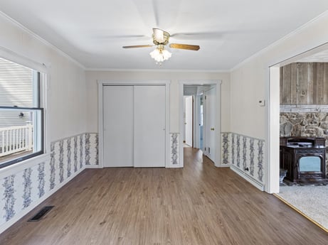 An image featuring property, ceiling fan, wood, fixture, window, interior design, flooring, floor, laminate flooring, wood stain at 199 S Lake Rd.