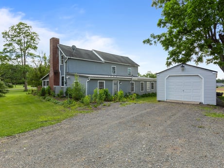 An image featuring sky, plant, property, cloud, building, tree, land lot, house, asphalt, cottage at 5442 Clarkstown Rd.
