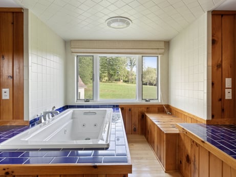 An image featuring window, fixture, wood, interior design, architecture, floor, flooring, building, wood stain, real estate at 130 Haighs Pond Rd.