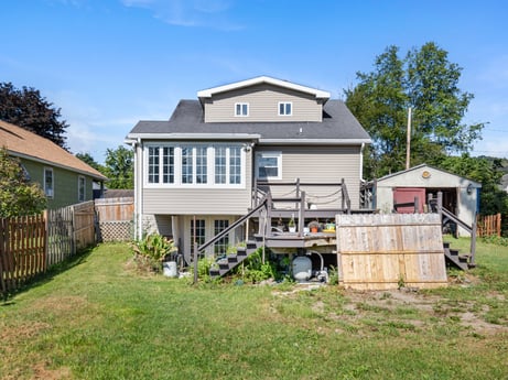 An image featuring plant, sky, building, window, tree, land lot, house, cloud, grass, neighbourhood at 132 Wilbur St.