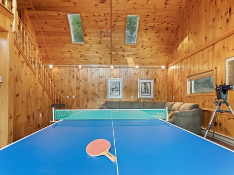 An image featuring property, building, tripod, wood, recreation room, house, interior design, field house, floor, leisure at 130 Haighs Pond Rd.