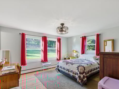 An image featuring furniture, table, cabinetry, wood, comfort, drawer, interior design, building, flooring, window at 62 Leons Rd.