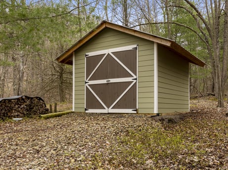 An image featuring property, plant, wood, tree, grass, building, land lot, sky, house, siding at English Hollow Ln.