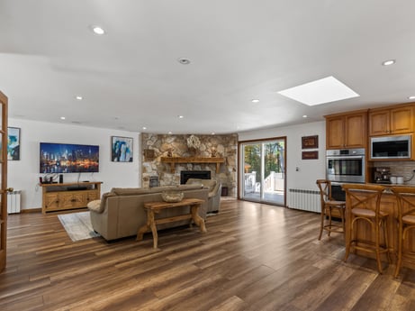 An image featuring picture frame, table, furniture, chair, couch, wood, lighting, houseplant, interior design, living room at 125 Rimstone Ct.
