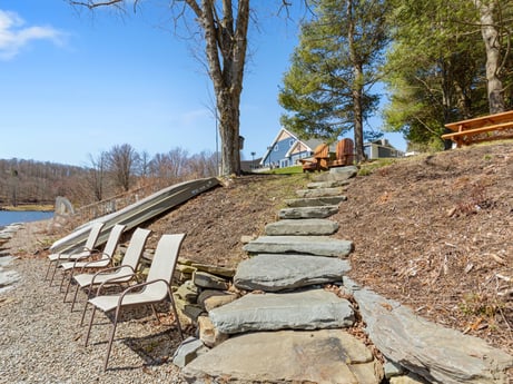 An image featuring sky, wood, tree, natural landscape, water, biome, slope, stairs, landscape, rural area at 144 Milton Ln.