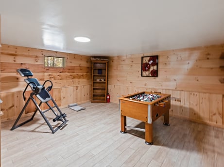 An image featuring table, building, furniture, window, wood, house, interior design, flooring, wood stain, ladder at 125 Rimstone Ct.