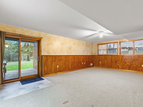 An image featuring building, wood, fixture, shade, plant, window, floor, wood stain, flooring, hardwood at 74 Susquehannock Trail.