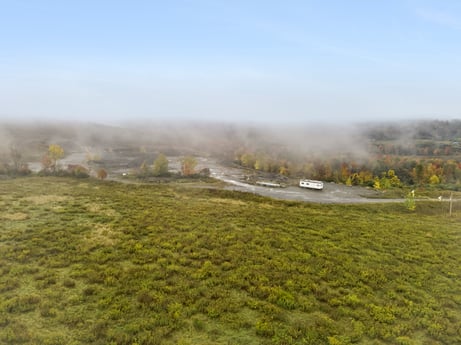 An image featuring sky, cloud, plant, natural landscape, fog, atmospheric phenomenon, grass, plain, landscape, grassland at Cheney Road.