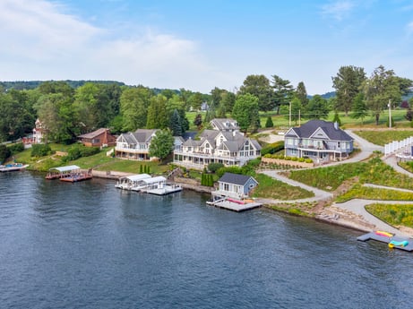 An image featuring water, cloud, sky, building, tree, lake, house, plant, watercourse, coastal and oceanic landforms at 218 Point Rd.
