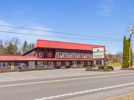 An image featuring sky, cloud, building, plant, window, asphalt, road surface, house, neighbourhood, residential area at 4741 US-220.