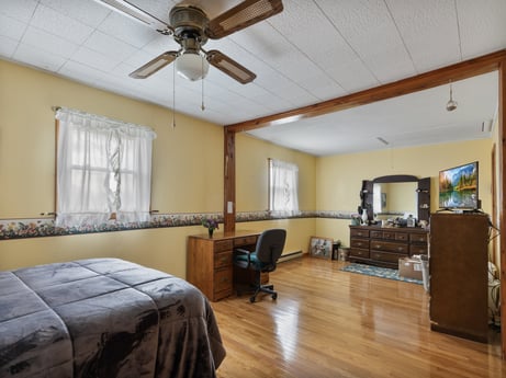 An image featuring ceiling fan, wood, building, lighting, interior design, comfort, floor, window, flooring, mechanical fan at 1195 Twin Cuts Rd.