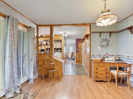 An image featuring table, furniture, cabinetry, chair, wood, drawer, door, interior design, flooring, floor at 1195 Twin Cuts Rd.