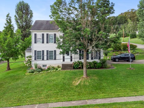 An image featuring plant, sky, building, window, tree, house, architecture, land lot, grass, car at 105 Thomas St.