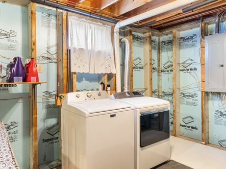 An image featuring building, interior design, architecture, house, floor, wall, flooring, real estate, home appliance, washing machine at 105 Thomas St.