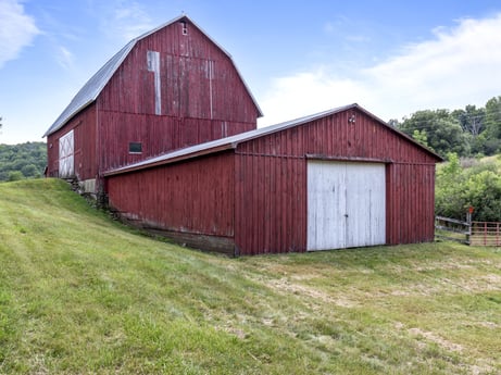 An image featuring sky, cloud, wood, plant, tree, building, land lot, house, fixture, grassland at 1863 Sopertown Rd.