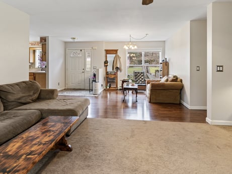 An image featuring couch, table, furniture, picture frame, wood, comfort, lighting, houseplant, interior design, floor at 1841 Lynch Rd.