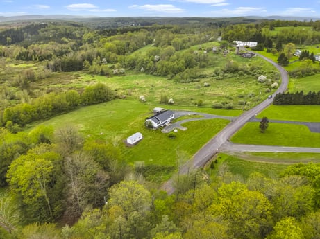 An image featuring plant, property, sky, natural environment, cloud, tree, natural landscape, land lot, grass, grassland at 993 Dieffenbach Rd.