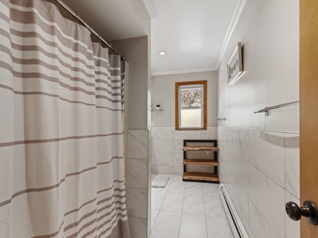 An image featuring property, fixture, picture frame, interior design, wood, architecture, floor, flooring, ceiling, real estate at 125 Rimstone Ct.