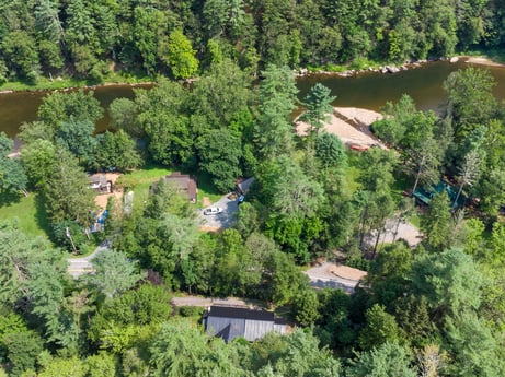 An image featuring plant, plant community, ecoregion, natural landscape, tree, water, land lot, urban design, landscape, real estate at 9224 PA-87.