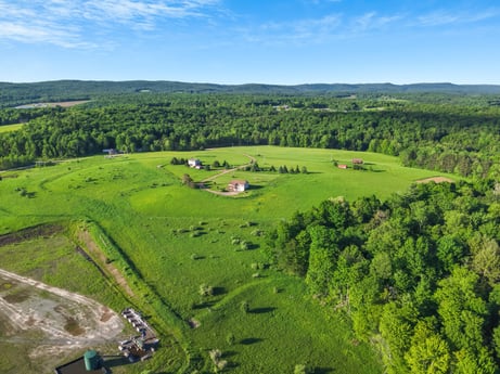 An image featuring sky, cloud, natural landscape, highland, tree, land lot, grass, mountain, grassland, plain at 85 View Rd.