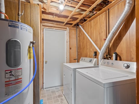 An image featuring property, fixture, lighting, interior design, wood, window, floor, house, wall, flooring at 491 Hillcrest Dr.