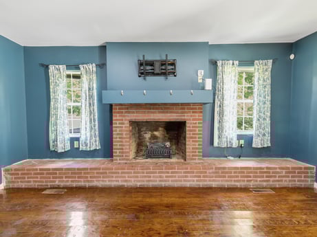 An image featuring building, hall, wood, hearth, flooring, floor, wood stain, window, rectangle, paint at 5442 Clarkstown Rd.