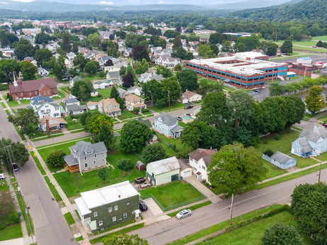 An image featuring daytime, property, sky, plant, building, green, tree, land lot, urban design, neighbourhood at 203 Harrison St.