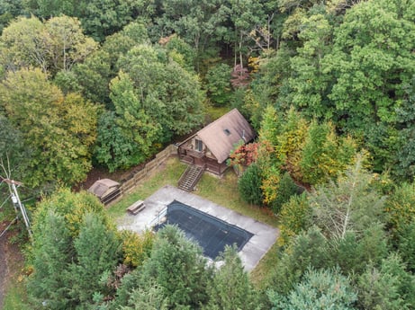 An image featuring plant, plant community, building, tree, natural landscape, land lot, landscape, rural area, roof, geological phenomenon at 121 Marcy Rd.