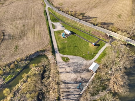 An image featuring water resources, ecoregion, plant, slope, land lot, urban design, thoroughfare, landscape, residential area, grass at River Access Rd.