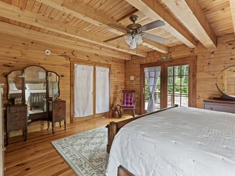 An image featuring property, window, picture frame, wood, building, ceiling fan, lighting, interior design, comfort, floor at 1761 Brick House Rd.