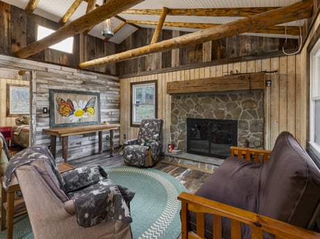 An image featuring property, furniture, picture frame, couch, building, wood, interior design, living room, floor, flooring at English Hollow Ln.