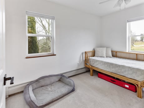 An image featuring window, comfort, fixture, building, wood, ceiling fan, interior design, shade, rectangle, floor at 18 Country View Dr.