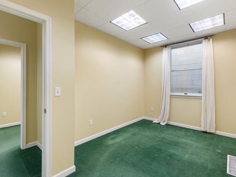 An image featuring fixture, window, building, wood, floor, flooring, real estate, ceiling, hardwood, hall at 213 Main St.