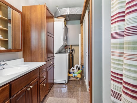 An image featuring cabinetry, furniture, property, countertop, sink, wood, drawer, building, interior design, flooring at 145 Nichols Ln.