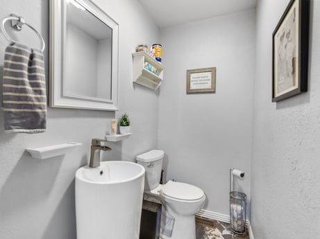 An image featuring property, picture frame, sink, building, interior design, mirror, wall, real estate, plumbing fixture, toilet at 17899 US-6.