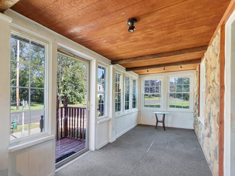 An image featuring window, building, wood, porch, interior design, plant, architecture, fixture, wood stain, floor at 132 Wilbur St.