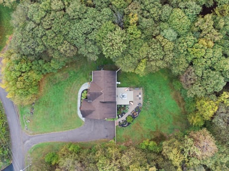 An image featuring plant, natural landscape, land lot, house, urban design, grass, watercourse, shrub, landscape, groundcover at 92 Sunrise Dr.