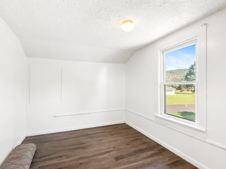 An image featuring property, window, fixture, building, wood, interior design, floor, flooring, paint, wall at 132 Wilbur St.