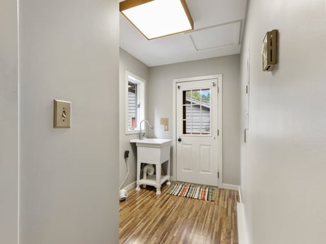 An image featuring building, fixture, wood, interior design, architecture, floor, flooring, window, real estate, hardwood at 276 Mountain View Ln.