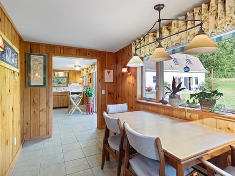 An image featuring plant, table, furniture, property, picture frame, chair, houseplant, wood, lighting, interior design at 130 Haighs Pond Rd.
