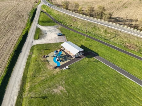 An image featuring plant, land lot, natural landscape, grass, grassland, plain, landscape, asphalt, agriculture, meadow at River Access Rd.