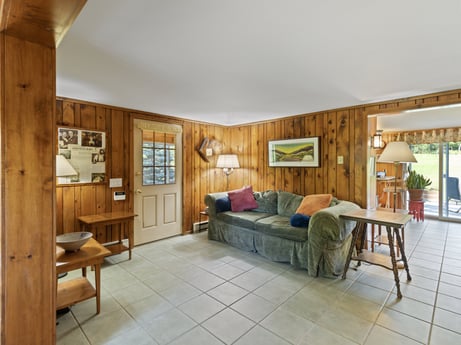 An image featuring building, furniture, table, picture frame, plant, couch, comfort, wood, house, flooring at 130 Haighs Pond Rd.