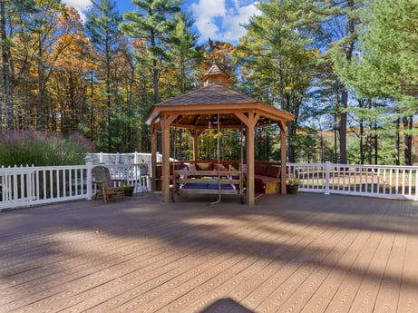 An image featuring plant, cloud, sky, shade, tree, wood, fence, leisure, outdoor furniture, real estate at 125 Rimstone Ct.